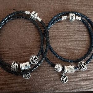 Two Pandora bracelets and charms